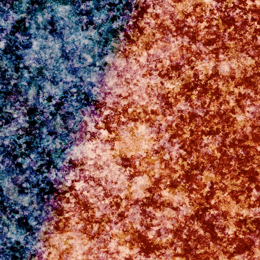 The same edge with every grain sharp: overlapping translucent flakes of different sizes, blue on the left and orange on the right.