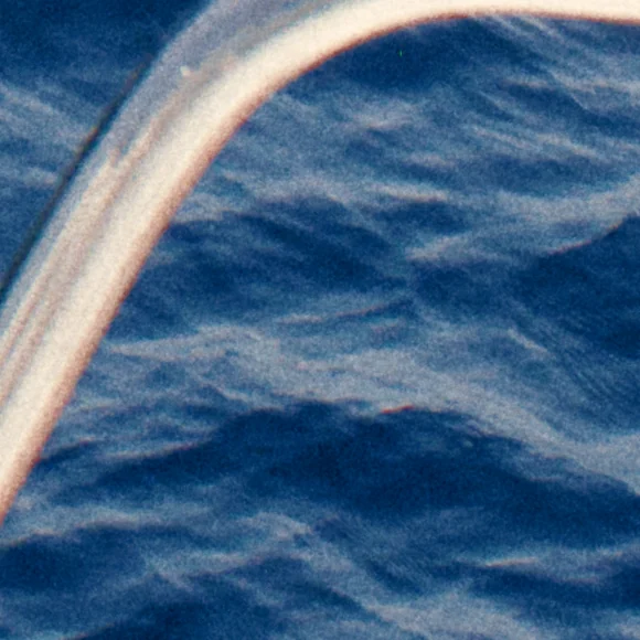 Digital grain on the same sea and rail.