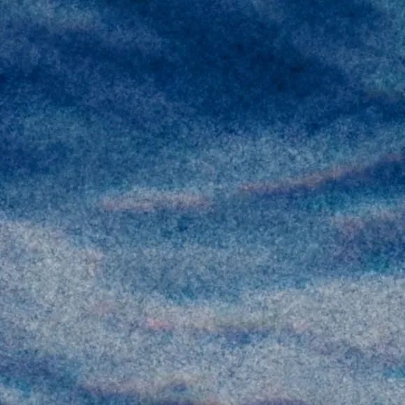 Digital grain, closer: fine and even.