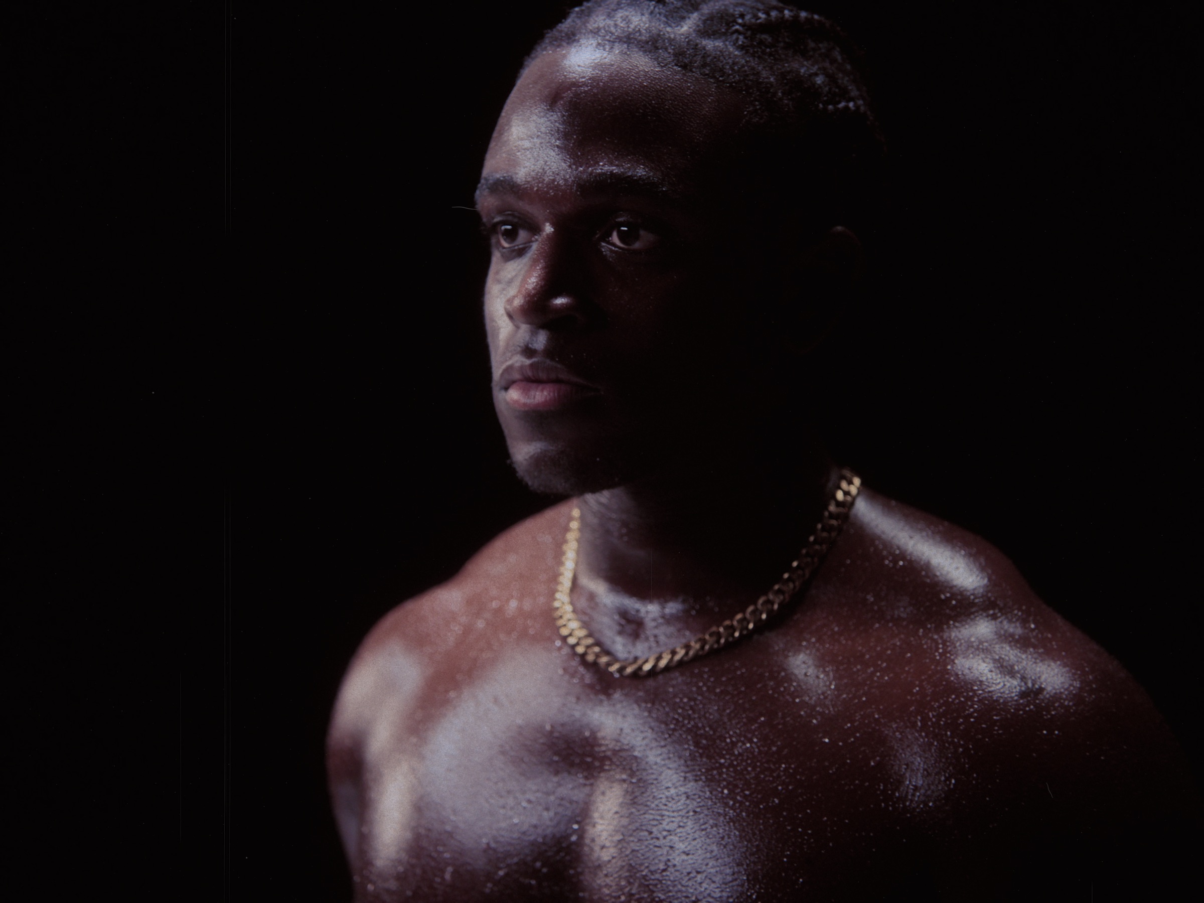 A portrait in low light, pushed by the amount the slider shows